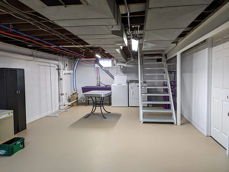 Laundry area and entrance to Bonus Rooms