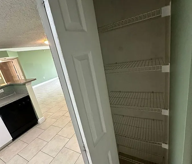 5005 Wiles Rd #102 — Photo 12