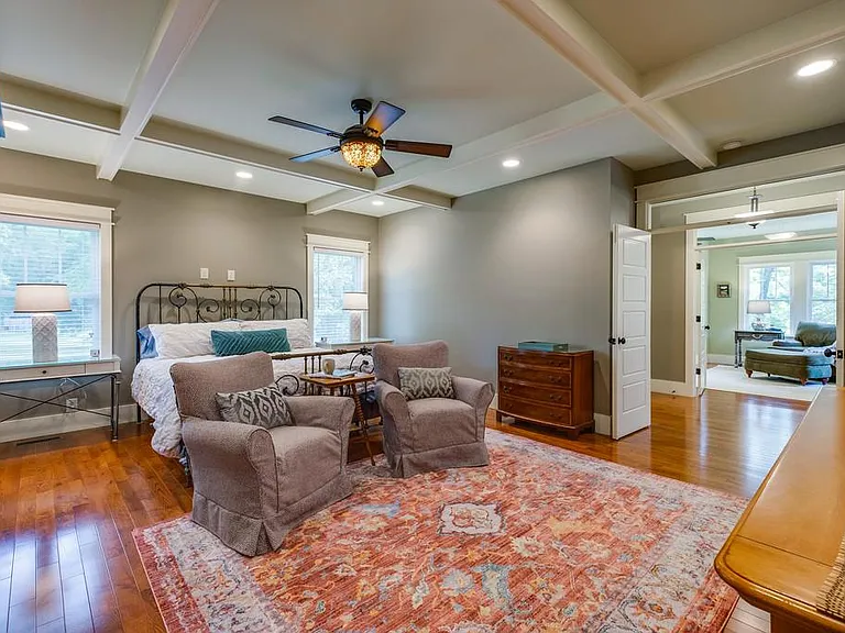 Master bedroom with a king-sized bed.