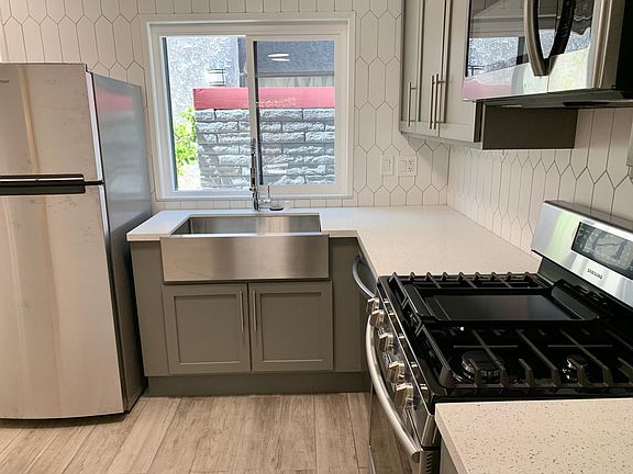 Newly renovated kitchen. Kitchen window also features privacy frosting (not shown)