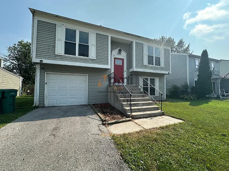 1031 W 59th Pl — Photo 2