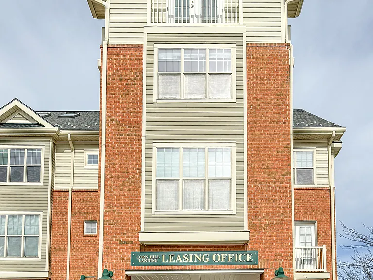 Leasing Office entrance at south end of building along the Genesee River