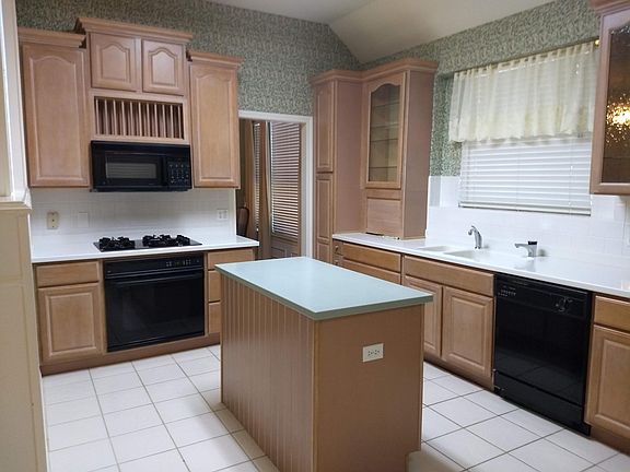 Kitchen with island and lots of storage