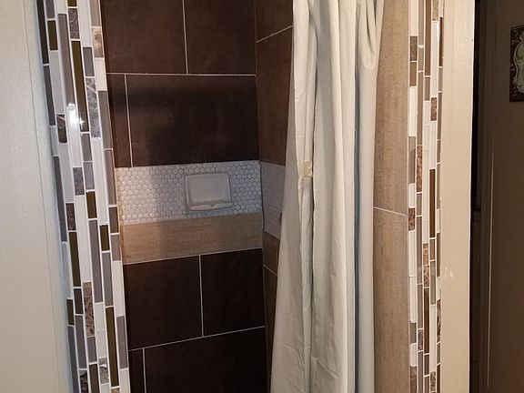 Tile shower, no tub