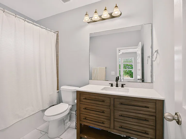 Bathroom to bedroom 1