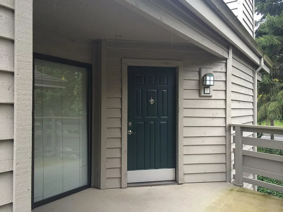 Condo Unit Front Door & Patio