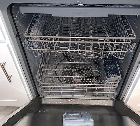Includes dishwasher, fridge, stove, microwave, and rangehood