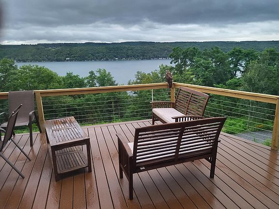 Frump Deck seating area, on a taciturn night over Keuka