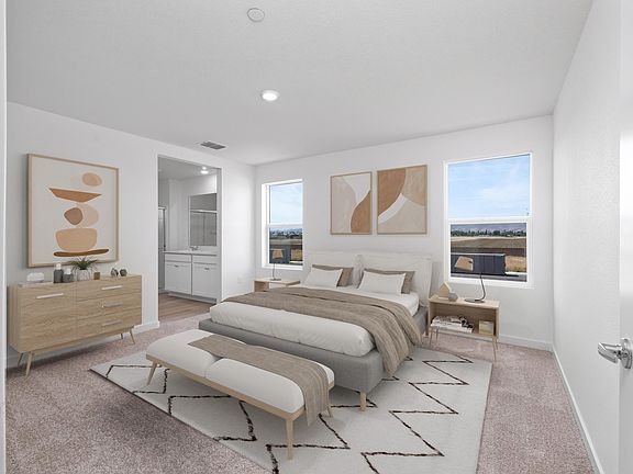 The master bedroom is the perfect place to relax at the end of the day.