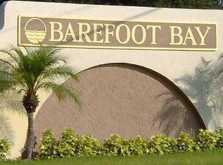 910 Hawthorn Cir, Barefoot Bay, FL 32976