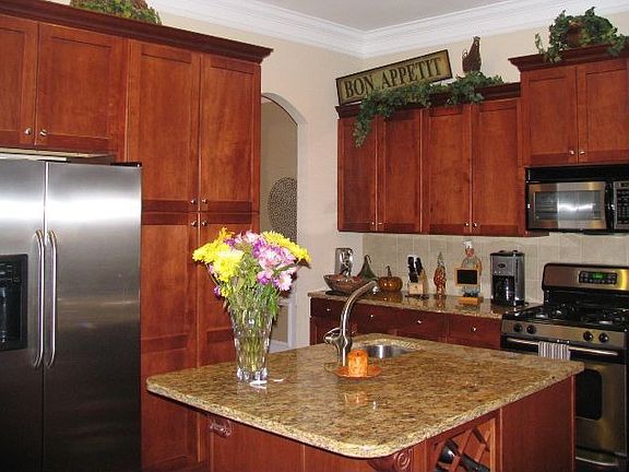 Kitchen with stainless steel appliances and granite counter tops