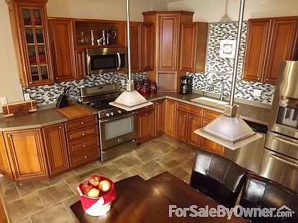 Kitchen Main Level
						:
						Modern amenities, stainless steel, neutral color scheme and tons of storage.