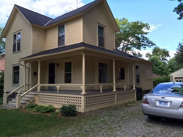 Front of house, driveway and garage