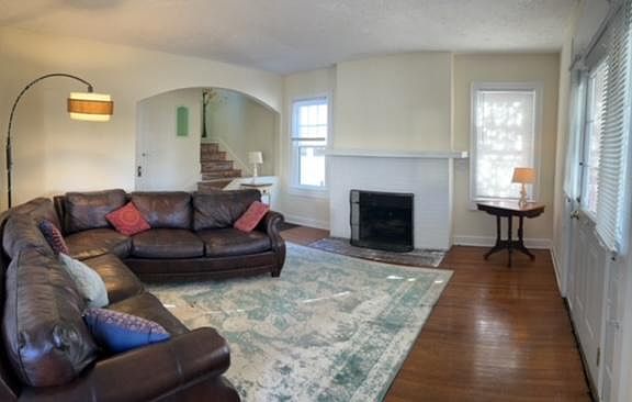 Full view of living room. Fully useable fireplace, with plenty roofer a big tv!