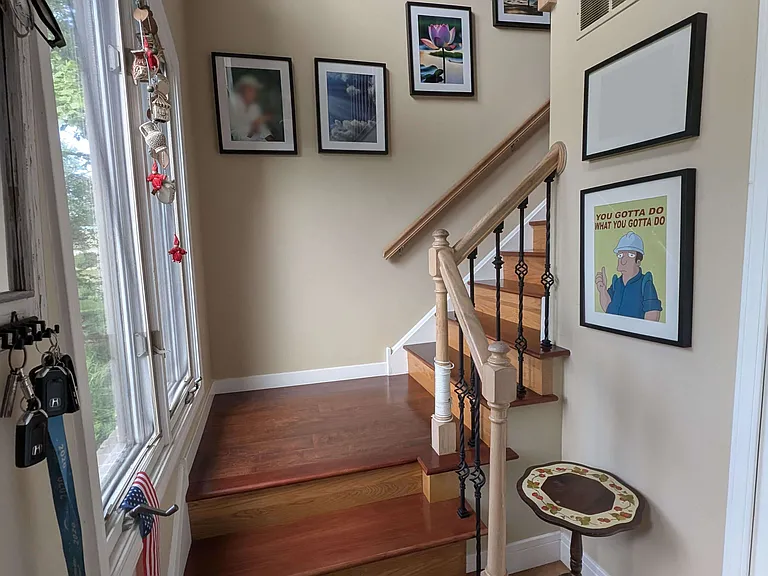 Hardwood stairs leading to the second floor