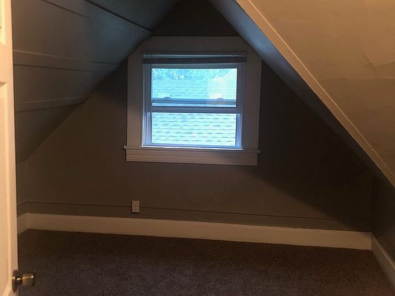 Unit 6 - Bedroom 2 or Living room area with closet/storage area.