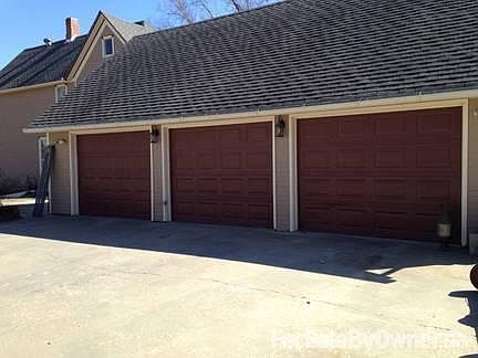 Three-car garage with loft space above