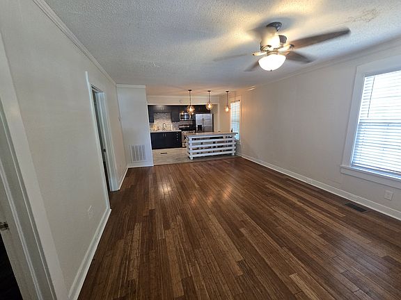 Large open living space With bamboo flooring