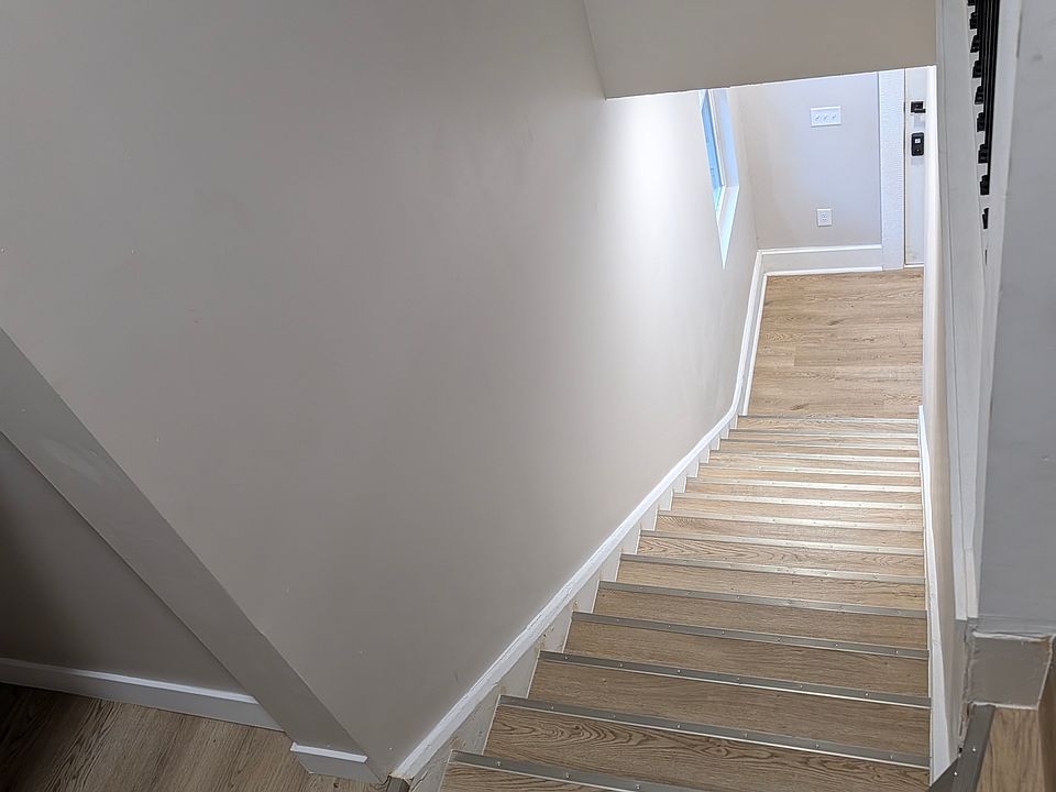 Another view from top of stairs with storage closet visible at the top