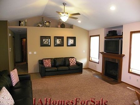 Great Room with gas fire place and tile surround.
