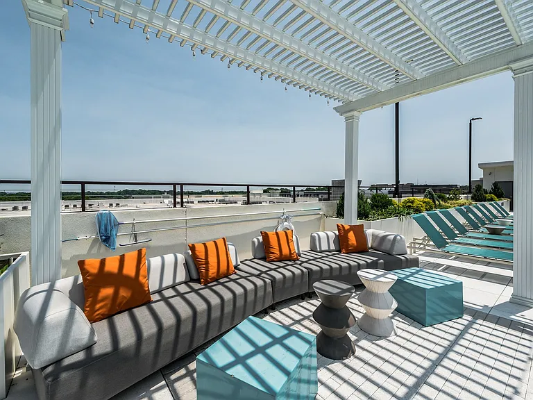 Lounge Sofas under Cabana on Rooftop Pool Deck