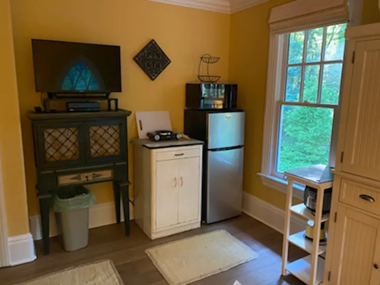 Private lounge/work room off of gold bedroom