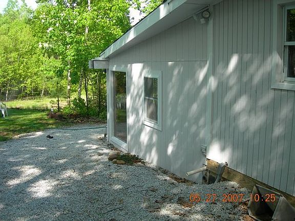 South side (sunroom in back)
