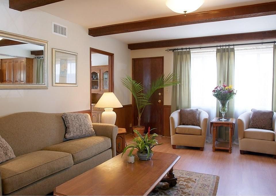 Family room off kitchen with upgraded flooring
