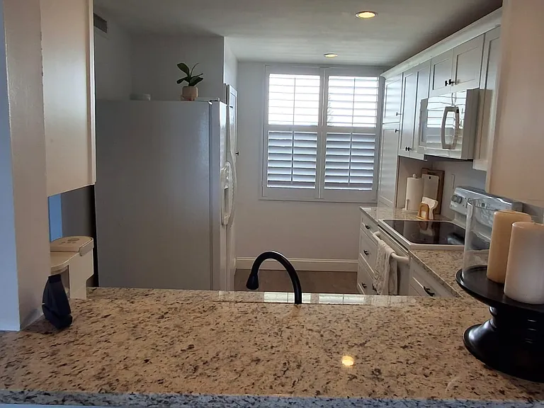 10600 S Ocean Dr #209 — Photo 49