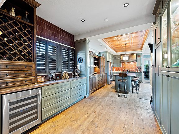 Wine refrigerator and storage