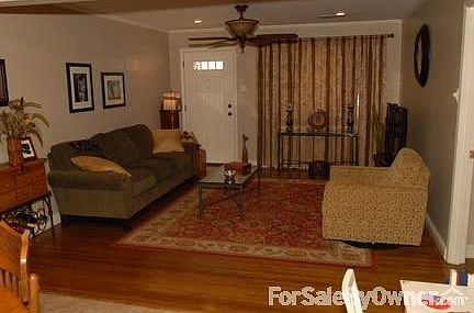 Living Room
						:
						Spacious living room with refinished, hard-wood floors.