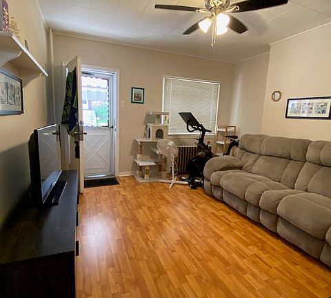 Living room with laminate wood flooring