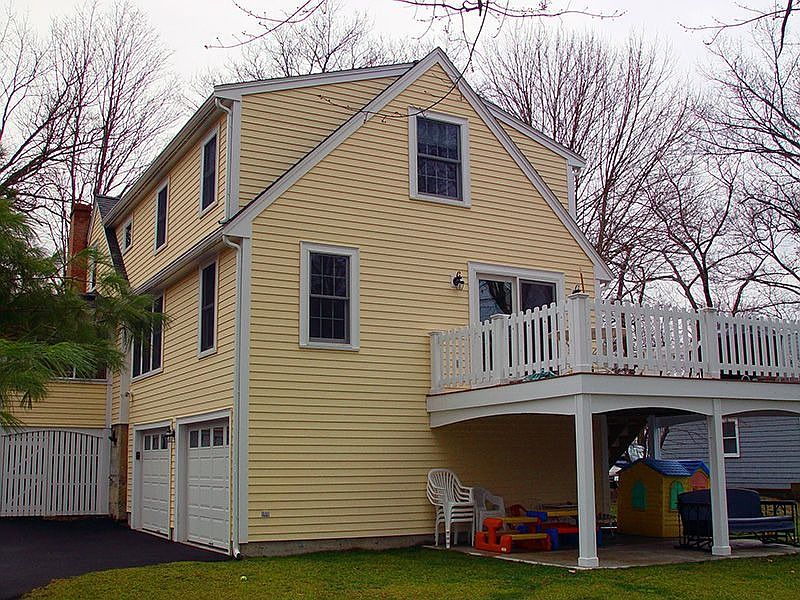 Rear view with deck and garage