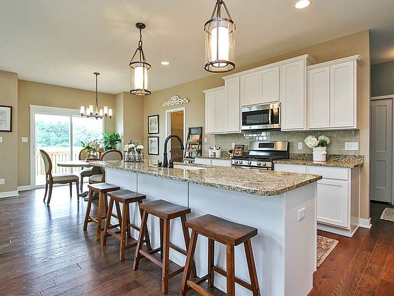 Nice sized island, walk in pantry and designer lighting package.