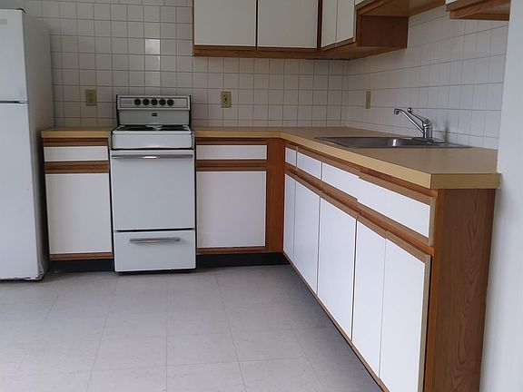 large kitchen with pantry and walk in storage