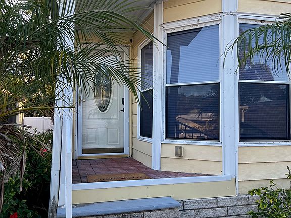 Front door, with storm door, and push button lock for convenience