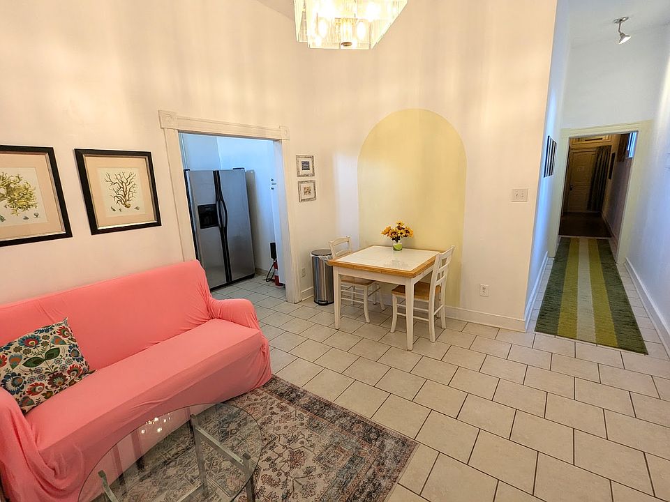 Living room, the kitchen on your left, the bedrooms and bathroom up ahead...