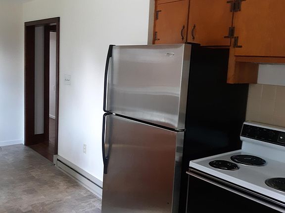 Refrigerator and stove come with unit.