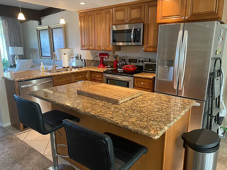 kitchen with new fridge, microwave, dishwasher and kitchen faucet. shared space and priviledges