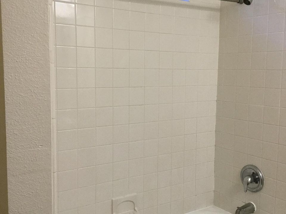 TUB AND SHOWER COMBO AT BOTH BATHROOMS