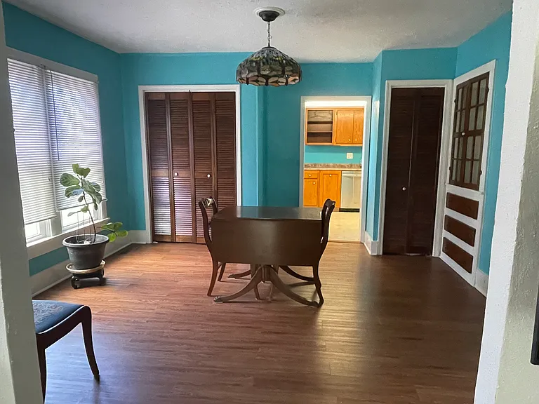 Lovely dining room adjacent to living room and kitchen.