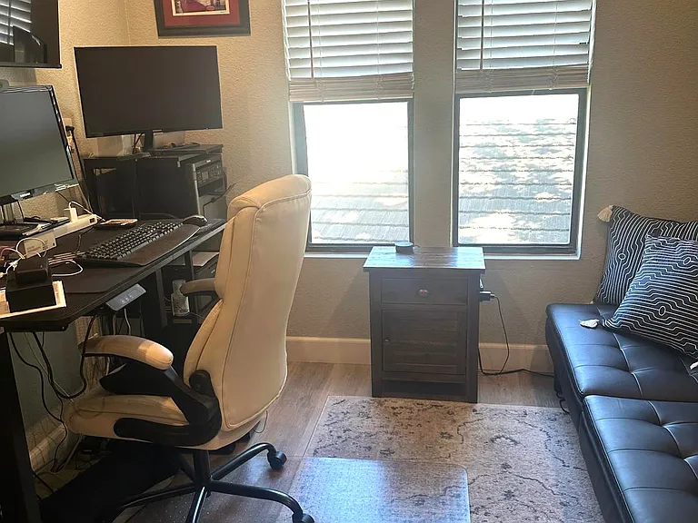 with office desk, mounted TV, printers, storage cabinet, small (2) end tables