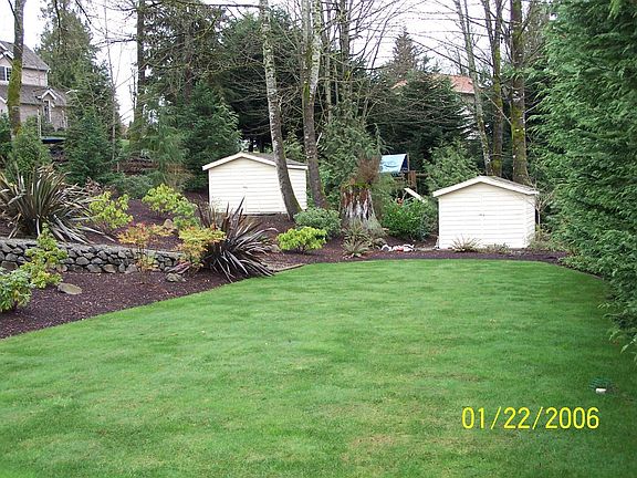 View of back yard (2 storage sheds)