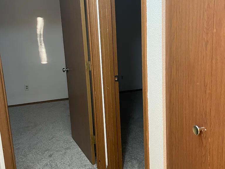 Linen closet and 2 bedrooms.