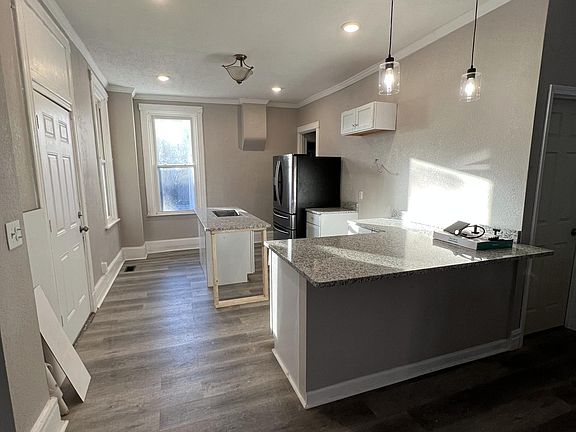 kitchen with island and bar seating