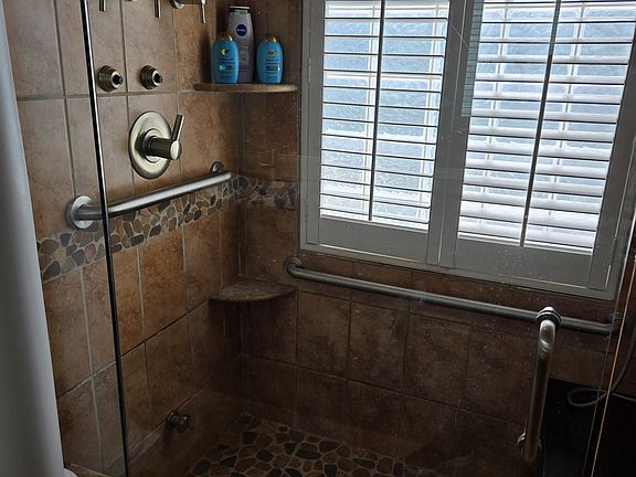 This shower has Overhead rain shower head 6 body shower spray nozzles, dual shower head, and sauna