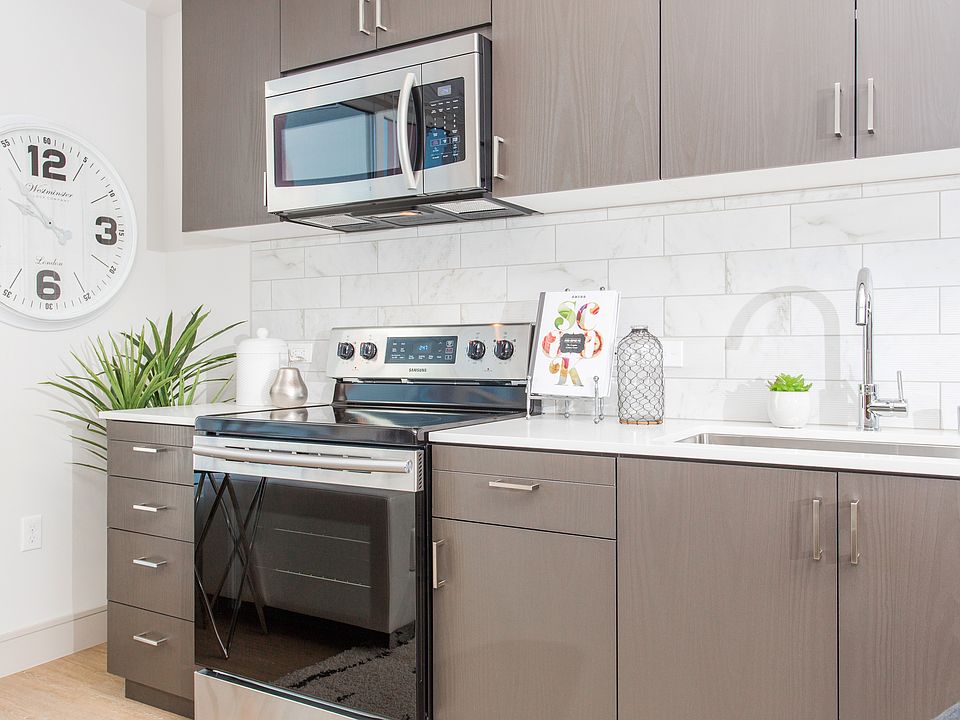 A sleek kitchen with everything you need_style, space, and function.