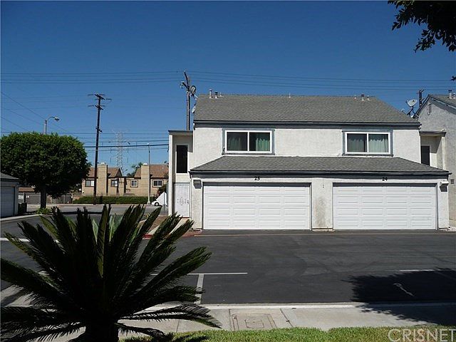Front View- End Unit - Just steps from the Pool & Spa