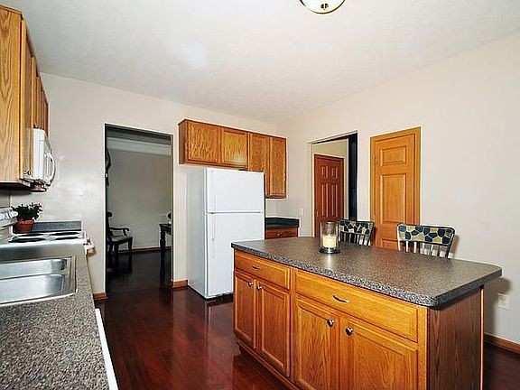 You will love the kitchen island storage and extra seating.