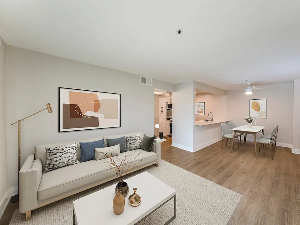 Renovated Package I dining and living room with hard surface flooring